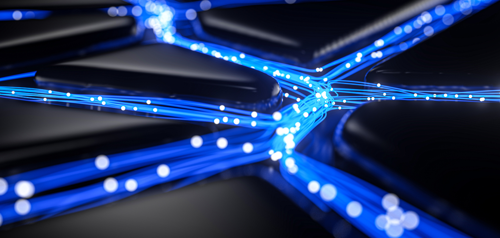 Blogbeitrag KI Datenströme Blaue LED auf schwarzer Fläche